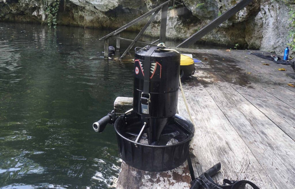 Underwater scooter used for freediving safety and training setup at a cenote in Mexico